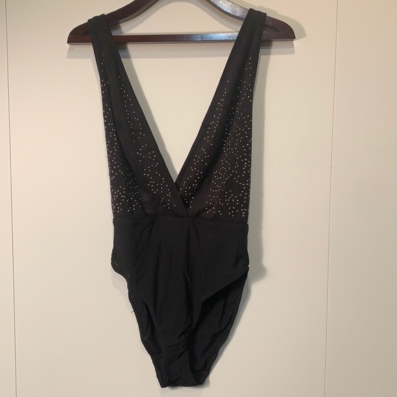 Urban Outfitters Tops - Sexy black bodysuit with studs. Perfect for a night out with hot red lipstick!